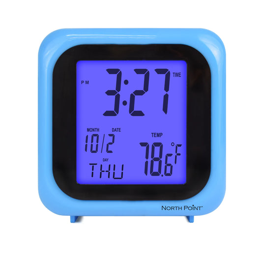 The North Point Blue Digital Clock with Indoor Temperature by North Point shows 3:27 PM, 10/2, Thursday, and 78.6°F on a bright backlit screen, featuring convenient alarm and snooze functions.