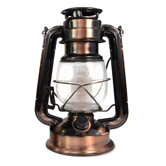 The North Point Vintage LED Lantern with Built-in Dimmer Switch features a copper finish, clear glass enclosure, and metal handle, displayed against a white background.