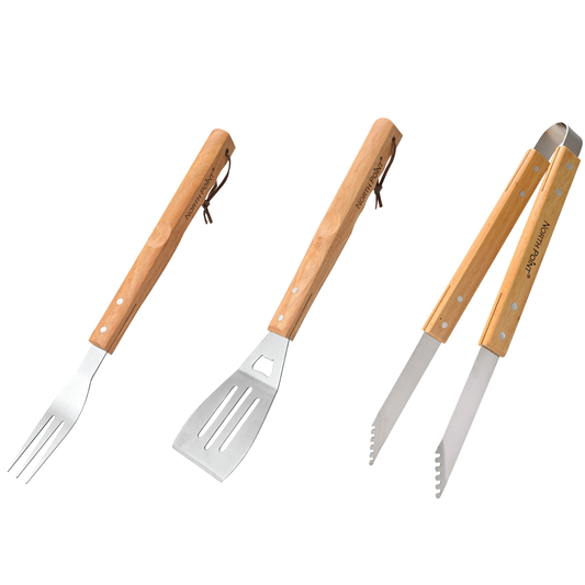A set of BBQ utensils with handles, including a 3-in-1 spatula, a fork, and tongs by North Point®.