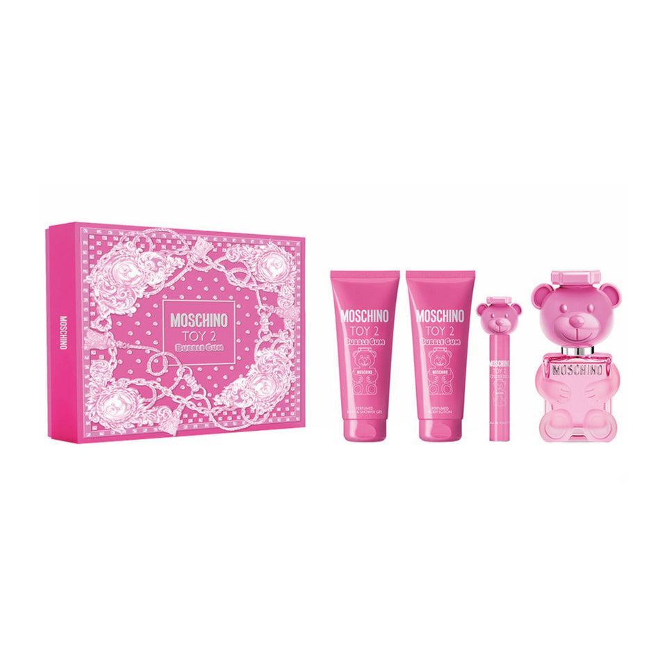 The Moschino Bubble Gum Set by North Point includes two body care products, a slim spray, and a bear-shaped perfume bottle in matching pink packaging—all presented in a decorated gift box.