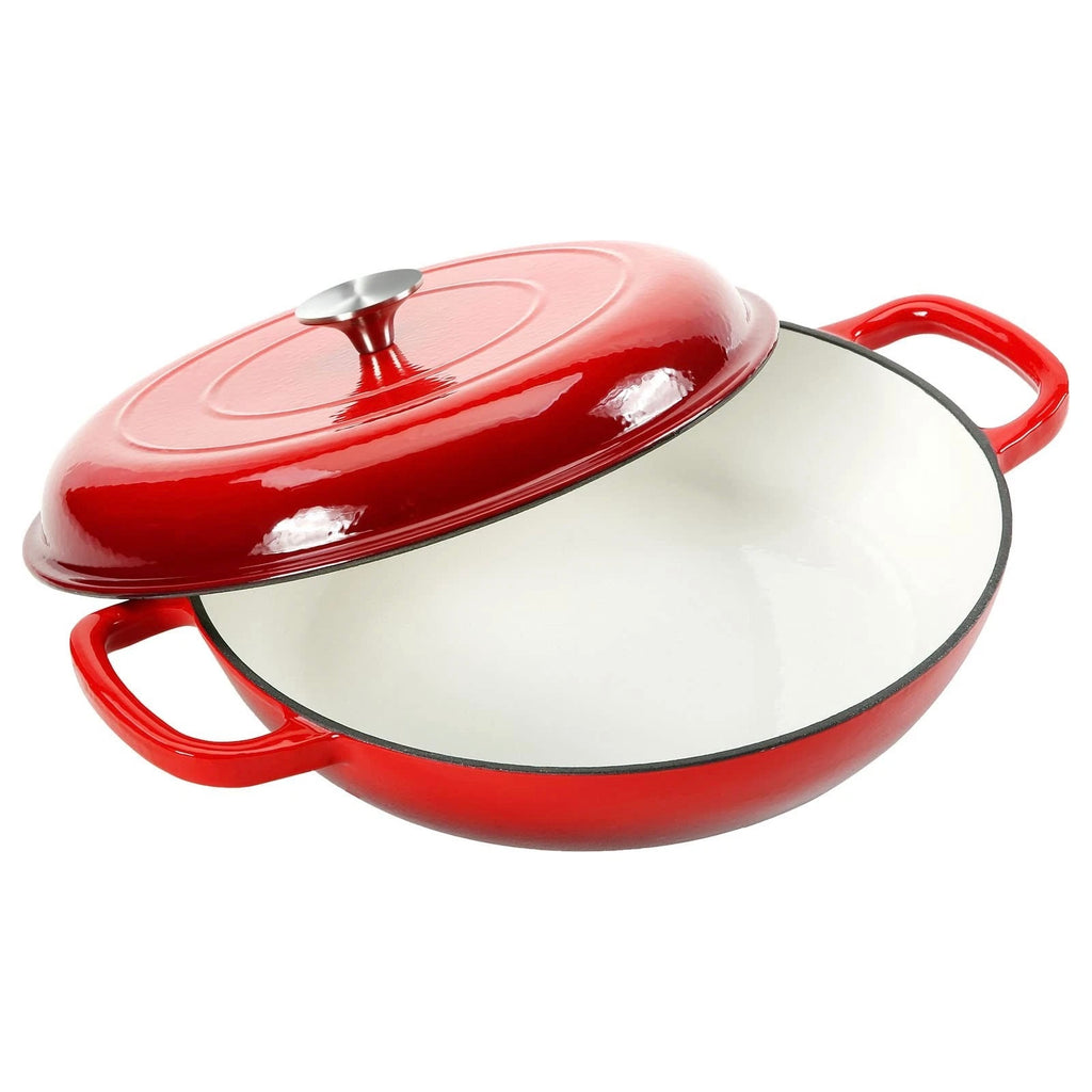 The North Point Red Enameled Cast Iron Casserole Dish with Lid features double handles, a matching lid partially lifted to reveal the white interior, and is oven safe—perfect for classic cooking.