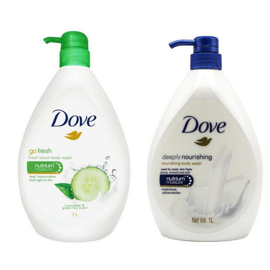 A 1-liter bottle of North Point Dove Body Wash with a blue pump dispenser and a white label featuring branding and a milk splash graphic.