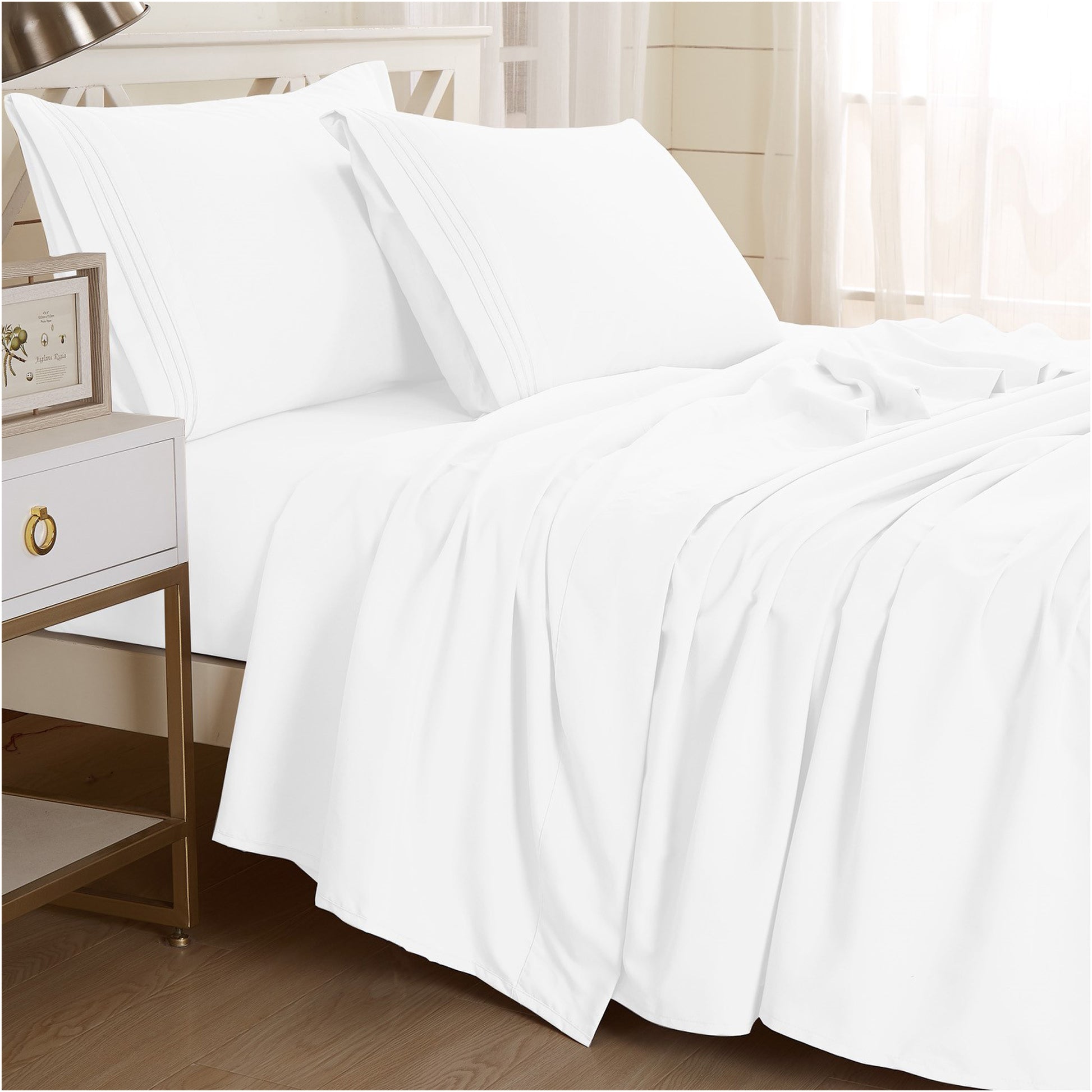 White-colored Textilia 4 Piece Bedsheet Set displayed on a bed. The rich white hue adds a touch of warmth and style to the bedding ensemble.