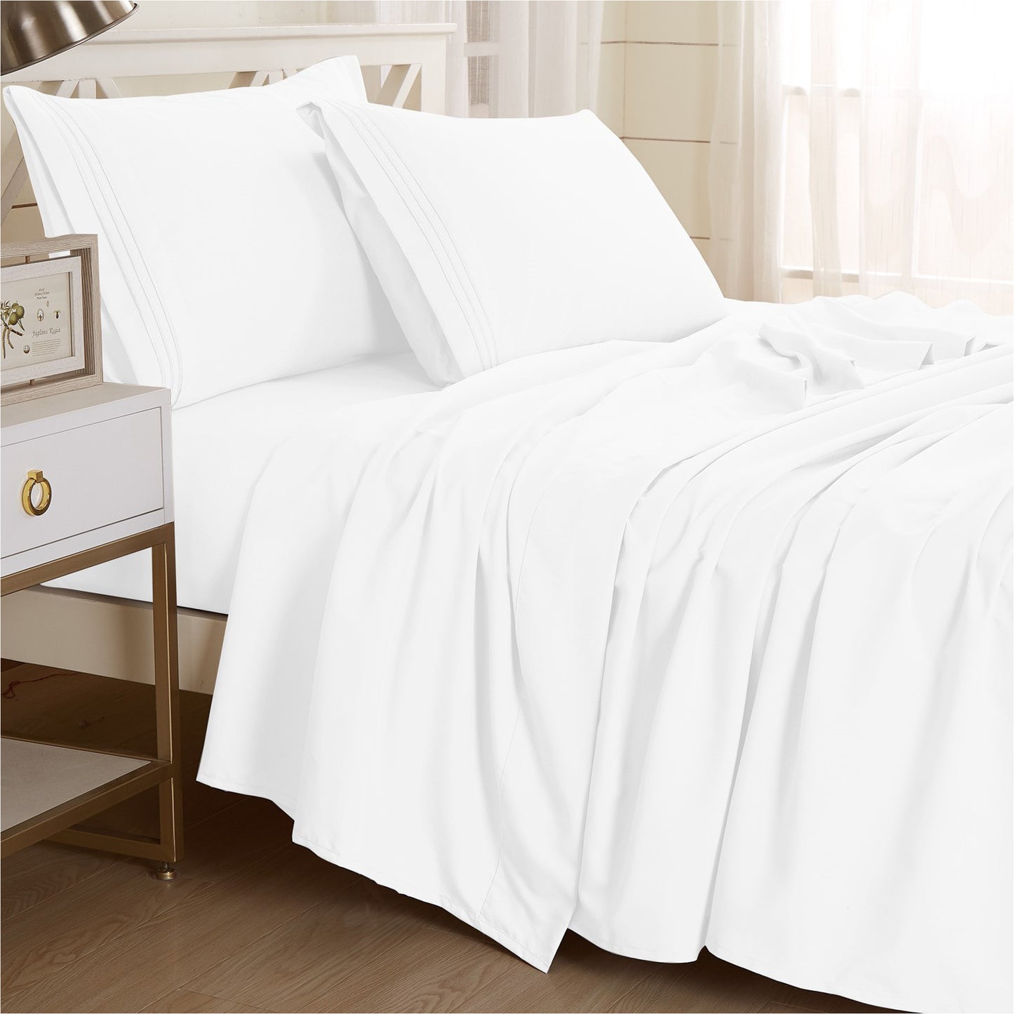 White-colored Textilia 4 Piece Bedsheet Set displayed on a bed. The rich white hue adds a touch of warmth and style to the bedding ensemble in king size, creating a visually appealing and inviting look.