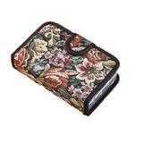 The Smart Essentials Floral 14-Day Pill Case Box features a rectangular floral tapestry design in green, red, cream, and purple with snap closure and four marked compartments—ideal for organizing your daily pills discreetly.