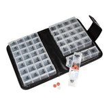 The Smart Essentials Floral 14-Day Pill Case Box features a zippered case holding multiple clear pill holders, each with 4 labeled compartments for days and times. One organizer is open, showing assorted pills inside marked sections.