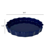 The Le Regalo Stoneware Pie Dish by Le Regalo is a dark blue fluted-edge dish, perfect for homemade pies. It measures 9.5 in diameter and 1.5 high.