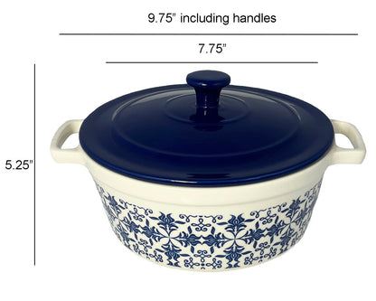 Le Regalo® white stoneware casserole with blue lid having filigree design in blue color displaying on a white background, featuring measurements indicating a 9.75-inch length including handles, 7.75-inch length without handles, and 5.25-inch height.