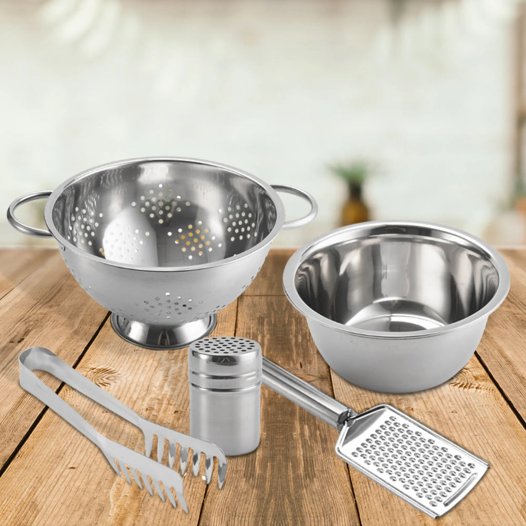The Le Regalo 5 Piece Stainless Steel Pasta Set includes a colander, mixing bowl, grater, tongs, and spaghetti server, all dishwasher safe and elegantly displayed on wood. Brand: Le Regalo.