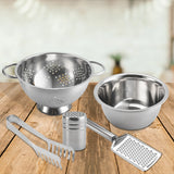 The Le Regalo 5 Piece Stainless Steel Pasta Set includes a colander, mixing bowl, grater, tongs, and spaghetti server, all dishwasher safe and elegantly displayed on wood. Brand: Le Regalo.