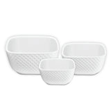 The Le Regalo 3 Piece Stoneware Square Bowl Set by Le Regalo features three white bowls with a subtle honeycomb design, perfect for versatile kitchen use in any home.