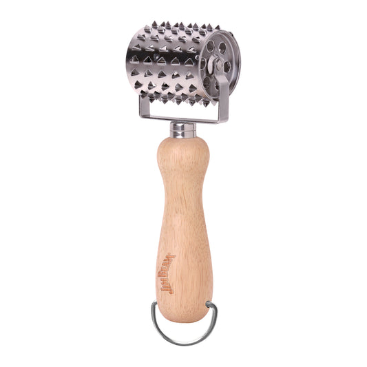 Jim Beam® stainless steel rolling meat tenderizer with sharp blades and a long wooden handle displaying on a white background.