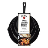 Three stacked black skillets from the Jim Beam Cast Iron 3 Piece Skillet Set, featuring a Jim Beam label and an image of cooked chicken and vegetables on the packaging.