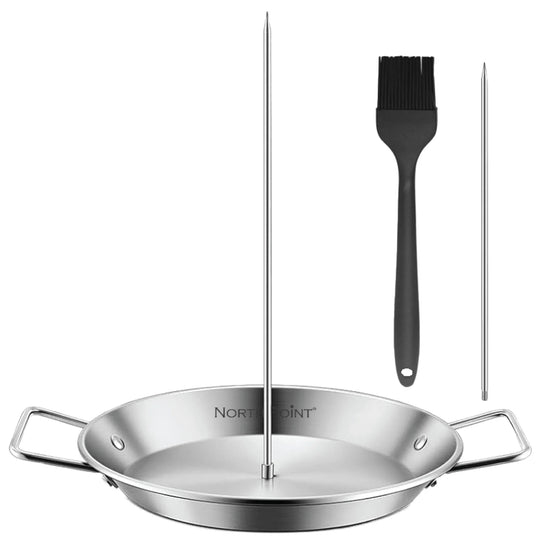 The North Point 4 Piece Skewer Grill Topper Set includes a stainless steel roasting pan with two handles, a vertical BBQ skewer, a long stainless-steel skewer, and a black silicone basting brush.