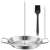 The North Point 4 Piece Skewer Grill Topper Set includes a stainless steel roasting pan with two handles, a vertical BBQ skewer, a long stainless-steel skewer, and a black silicone basting brush.