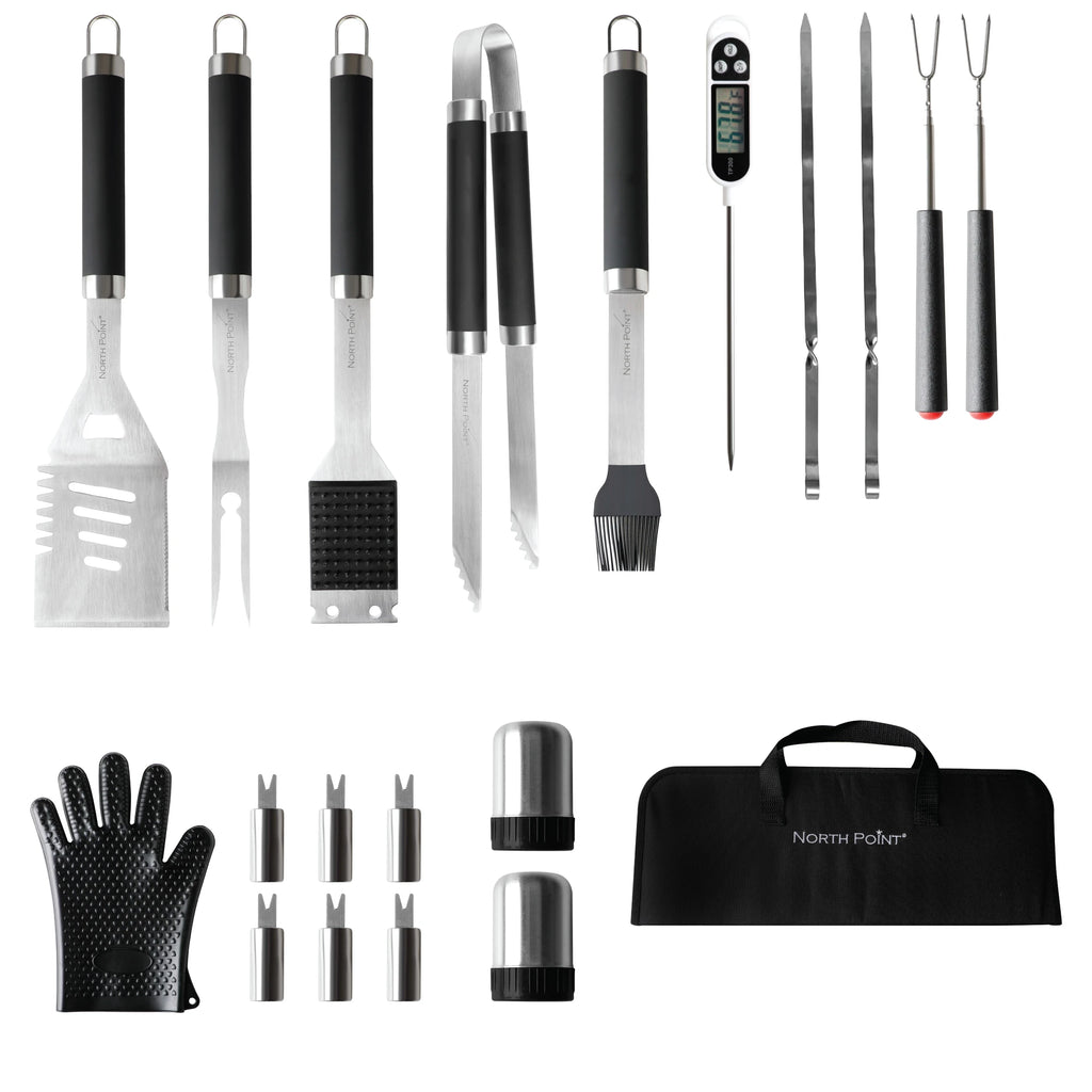 The North Point 20 Piece BBQ Tool Set includes stainless steel spatula, fork, basting brush, tongs, thermometer, skewers, meat forks, glove, corn holders, salt & pepper shakers—all in a black carry case. The ultimate grilling companion.