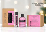 Three Donna Intense by Stallion 53 Eau de Parfum Spray Gift Set products by North Point are displayed: a box, a small spray bottle, and a larger round bottle with pink liquid, all set against a softly lit background.